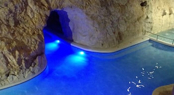 An intriguing thermal spa in Miskolc is built within a cave. There are several tunnels connecting larger pools, as well as sauna, steam room and thermal pools. 

A four hour ticket is 1500 HUF (5€), the sauna world is an extra 1000 HUF