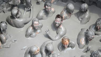 Take a therapeutic mud bath in a mud volcano at El Totumo. This spot is on a lake about halfway between Cartagena and Barranquilla. A strange sensation. You can't sink if you try!  