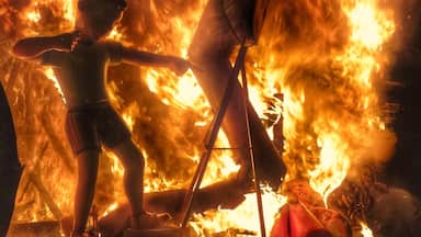 The culmination of the Fallas fiesta is when all the Falla monuments are engulfed by the purifying flames of fire. #red