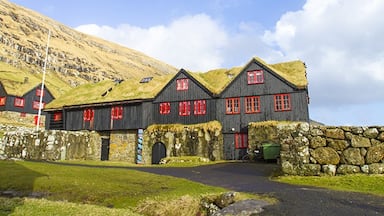 The hike from Torshavn to the old bishopric and royal residence where the Norwegian King Sverre grew up, takes a few hours. In the Middle Ages Kyrkjebo was the cultural and religious center in the Faroe Islands. The old log house is told to be Europe’s oldest timber building, around 900 years old. John Patursson is the host and farmer at Kyrkjebo, he’s 17. generation onsite. Read more on: http://www.travelwithallsenses.com/faroe-islands-treat-for-all-senses/