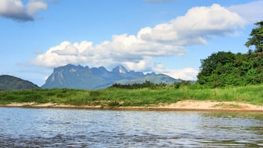 Views of the striking karst mountains in Laos are available from the slow boat from Thailand to Laos on the Mekong River.