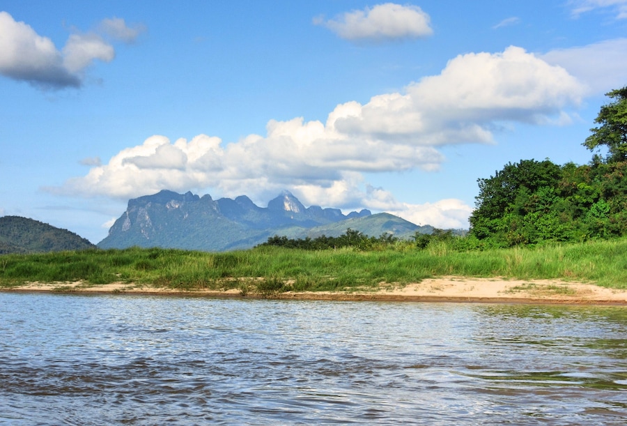Views of the striking karst mountains in Laos are available from the slow boat from Thailand to Laos on the Mekong River.