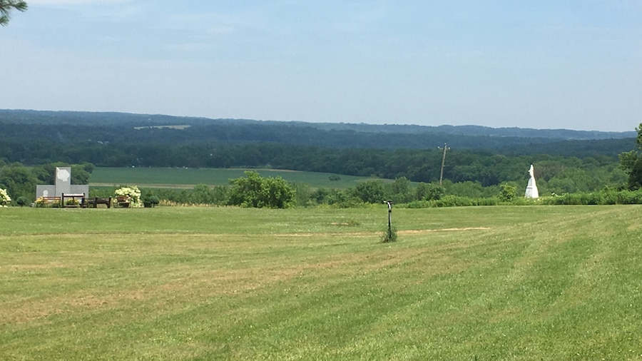 Statues are spread across the property.
