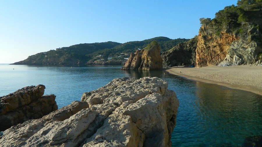 This was one of my favorite spots in Spain. It has clear blueish-green water and was great for swimming and jumping off the rock in front. There is a small cave in the far back corner on the beach which has many mosquito's at night (bummer). This photo was taking in the morning before it got over populated with naked Spaniards swimming and playing ping pong on the beach. I would come here again I had a great time and camped 2 nights on the beach. The location of the beach is the closest I can do but it is referred by the locals as