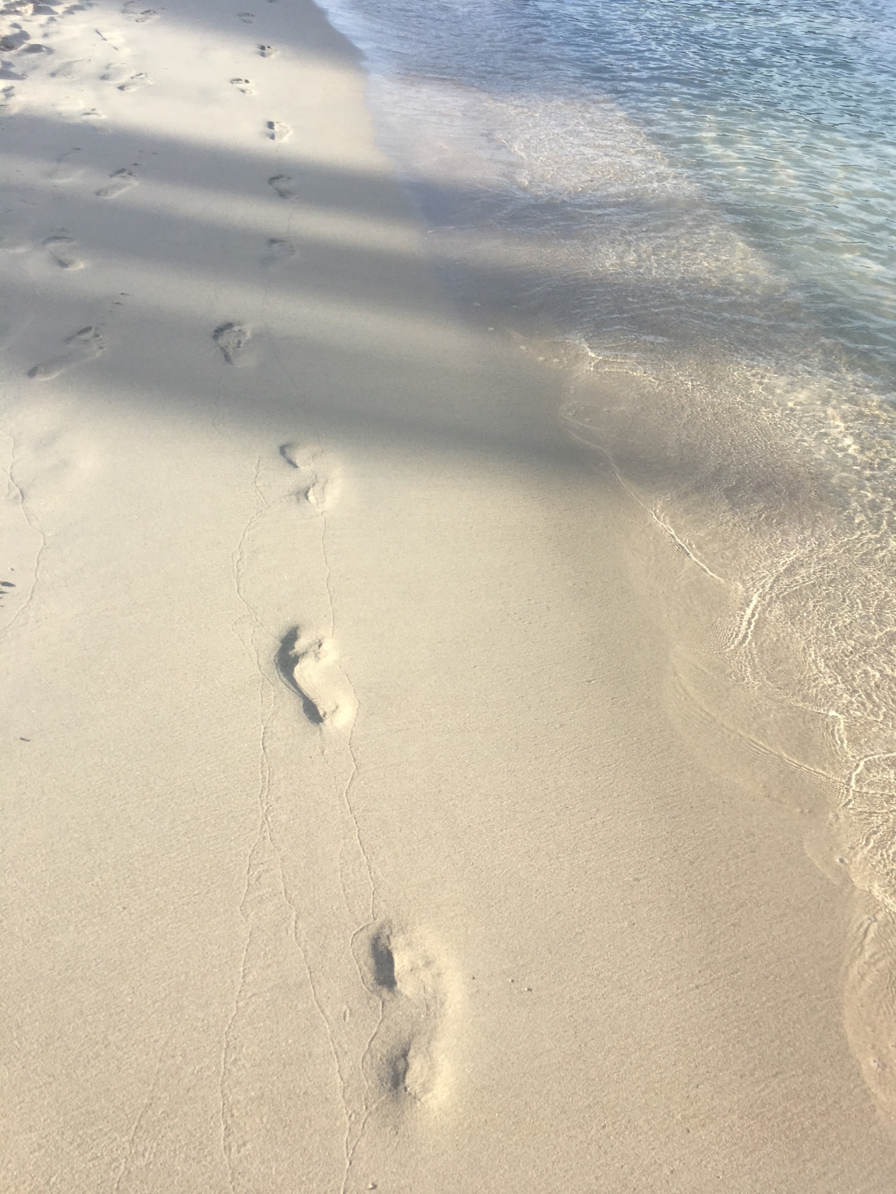 Warm waters lapping your feet, the softest white sand underfoot.