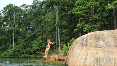 Rock jumping. Beautiful Lake in southern GA