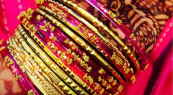 Colorful glass bangles and pretty henna. Bangle shops that sell colorful bangles to match the colors in your sarees!!! 
#riotofcolors 
#colorful 