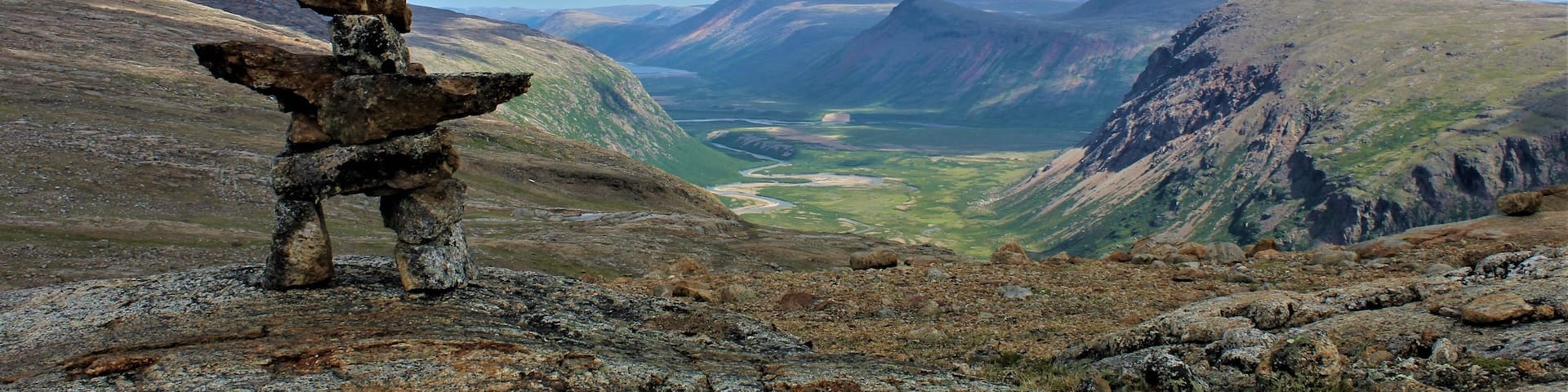 Last summer I visited Arctic Quebec and Labrador. I went on an Air Safari in the Torngat Mountains, I took a few exploratory hiked  in the overhang of Hebron Fjord, took amazing pictures of the U-shaped valleys, saw towering waterfalls, was able to observe polar bears and caribou. What strike me the most is the silence and vastness of the land and not an human around.