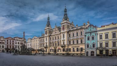 Pardubice became a town sometime around 1340. Back then it was owned by the Lords of Pardubice, the most prominent figure of the line being Arnošt of Pardubice, the first Archbishop of Prague, advisor and friend to Emperor Charles IV, a distinguished European personality of that time. Buildings on the square and adjacent streets bear the oldest traces of early gothic architecture. The neo-renaissance city hall of Pardubice is the main focal point.


Arnošt of Pardubice, the Velká Pardubická Steeplechase, the Golden Helmet, gingerbread – this is just a brief list of what Pardubice is famous for in the minds of people in the Czech Republic and the entire world. 

However, if you are not an enthusiastic historian, sports fan or culinary gourmand, you can catch up by reading the following crash course on the city. Pardubice lies on the point where the Labe and Chrudimka rivers meet and dates back to more than 700 years. 

The emblem, which Pardubice has been using as its symbol since the 12th century, is created from a silver horse on a red background. The city experienced its greatest flourishing during the time, when the estate belonged to the noble family the Pernštejns, who gave the historical centre of Pardubice’s its appearance. They say that Pardubice is a city of sports, horses and gingerbread, and it can also be considered the city of transportation. The historically first railway route from Olomouc to Prague leads through here, an international airport is situated here, you can reach the city by car and perhaps even by boat soon. So, now you know how to get to Pardubice.

#europe #czech #czechrepublic #city #cityscape #gothic #architecture #travel #history #instone #details
 



