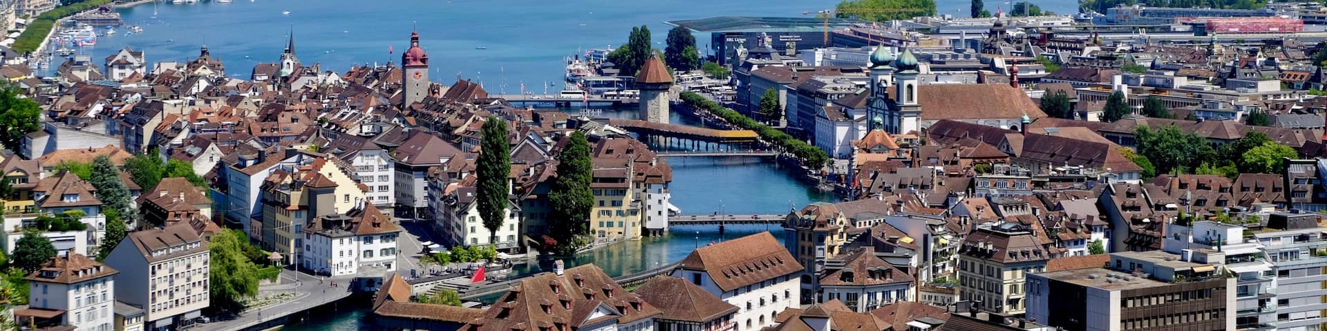 From the famous Chapel Bridge (center in the photo) we noticed the tower of the beautiful Château Gütsch. We decided to go and explore. A short ride up the hill with the Gütsch Bahn (mountain railway), we were on the hotel's terrace and were awarded with this magnificent view of Luzern. It was the best drink ever!
#AboveItAll