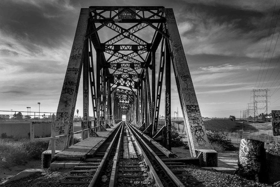 I was driving on the 710 Freeway when I saw this old bridge at a distance and I had to stop. It's not in a good area, but it's a great pic site.