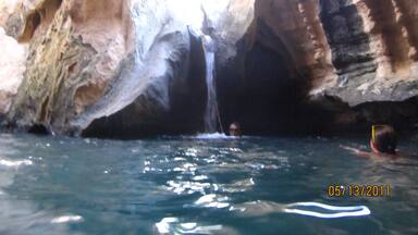 You must find someone to take you to a Wadi. Take water and food, you will hike for hours, but the views are amazing. Then at the top we swam through a small underwater passage and ended up inside this awesome waterfall cave!  One of the best experiences ever. We were with friends living and teaching there but you should not go alone. When the tide from the ocean comes in, you will not be able to get back to your car. You must know what you are doing when you hike a wadi.
http://www.omantourism.gov.om/wps/portal/mot/tourism/oman/home/experiences/nature/valleys/!ut/p/a0/04_Sj9CPykssy0xPLMnMz0vMAfGjzOItvc1dg40MzAz8fZzMDTyDQz0Mg92djN2NjfULsh0VAUrMXXQ!/