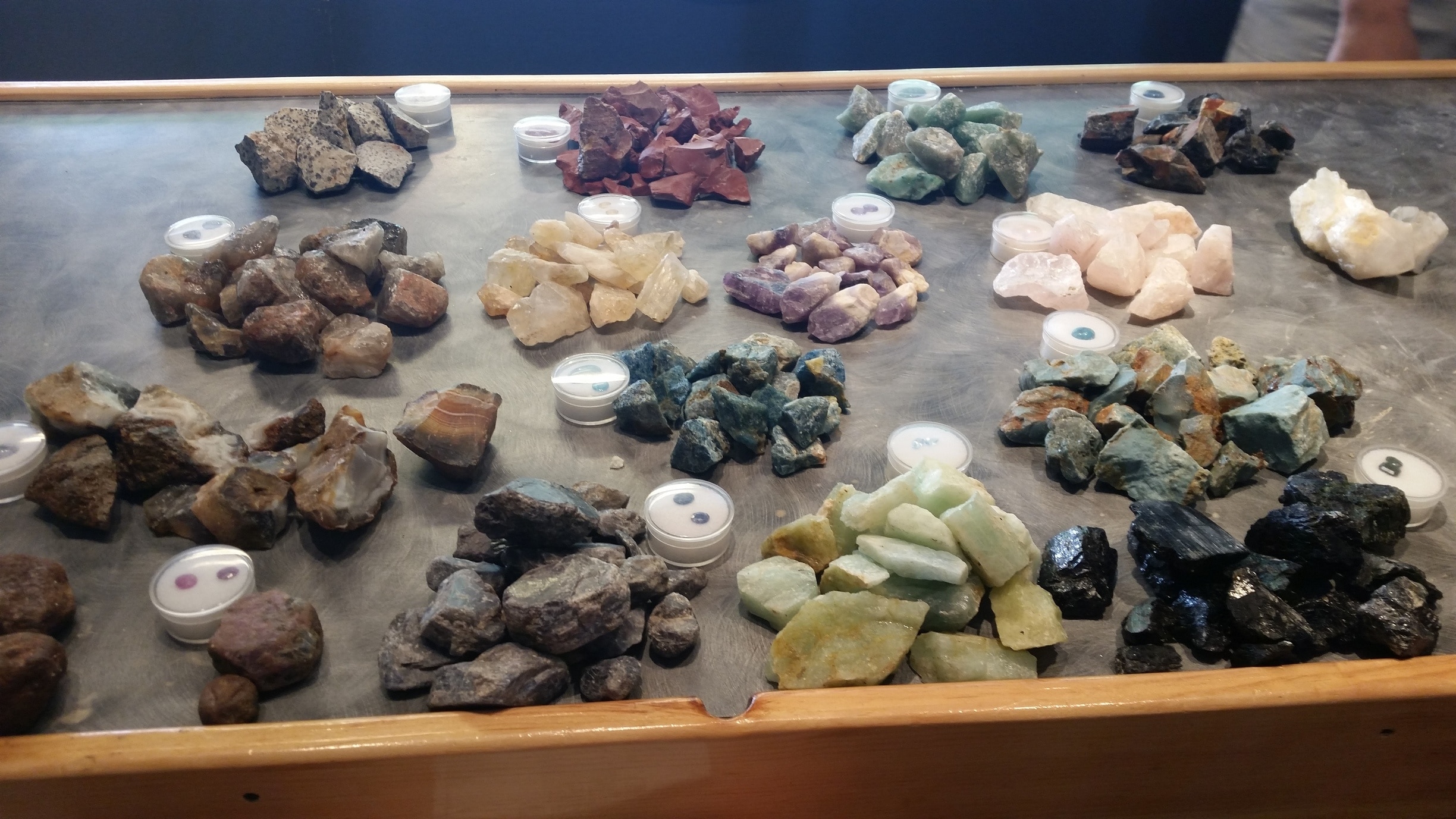 After you've found all the awesome gems in your bucket o' rocks they sort them out and tell you what you've found. We got all these from the mother load bucket. They'll cut and set them in jewelry for you as well