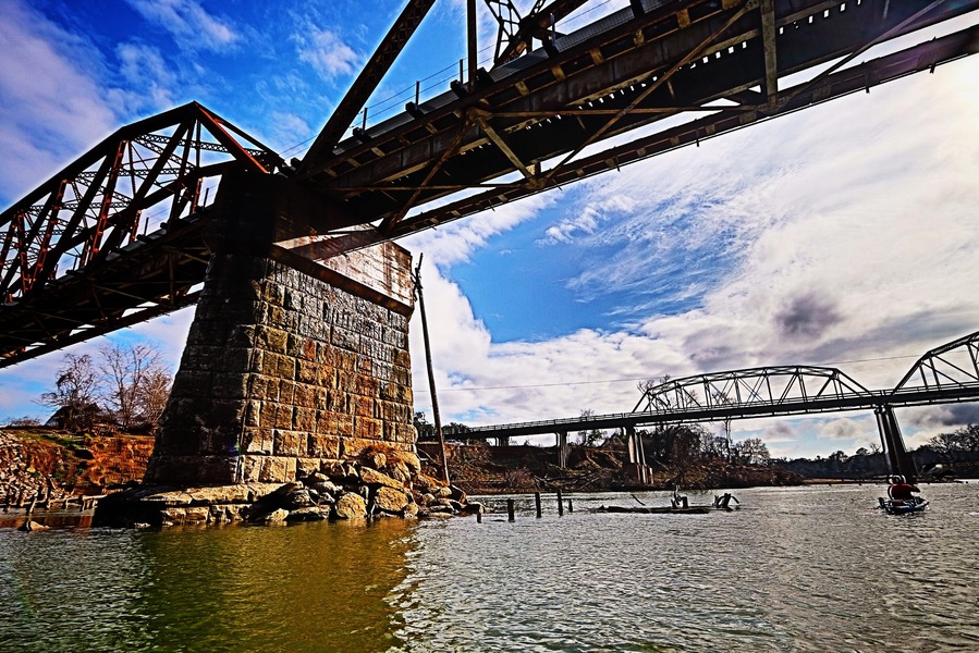 First trip with a new camera and new kayak! Really liked the craftsmanship on this old railroad bridge that's still in use. There we tons of old pilings and structures in the river just upstream from here from the old trestle and port. #getoutside #kayak #adventure #river