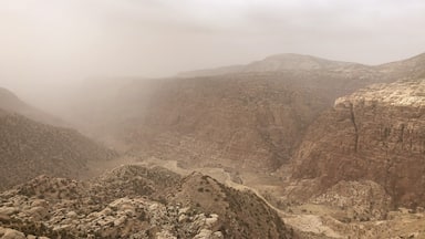 It began to get cloudy and rainy during the last leg of our trip. We stopped by this magical place while heading towards Airport. A Bedouin at Wadi Rum told us that clouds and rain is a sign that Winter is here and they  eagerly wait for the much needed rains in Jordan.