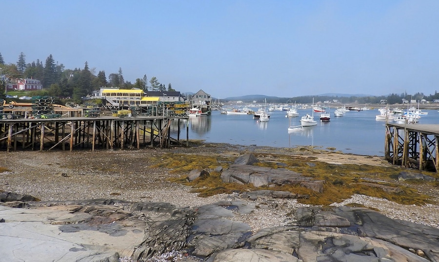 Low tide at the harbour in Bernard, Maine. The primary industry for the area is fishing with lobster being the dominant one, followed by scallops and shrimp, primarily in the winter months. Boat building and related services are important as it supports the fishing industries. Tourism primarily impacts the summer months. (September 2017)