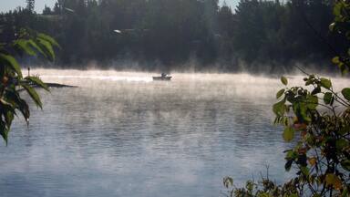 Early morning warmth on the Lake of the Woods in Anicinabe Park, Kenora.  Lake of the Woods is over 70 miles long and wide, and contains more than 14,552 islands and 65,000 miles of shoreline. Sixth largest freshwater Lake partly in the US after the 5 Great Lakes. #GreatOutdoors