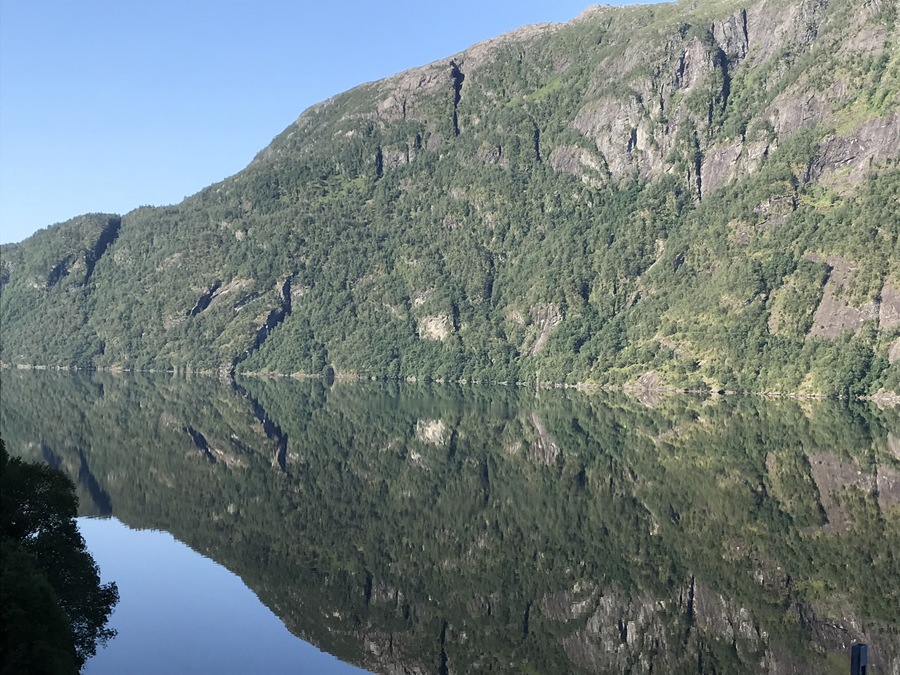 Driving to Voss from Bergen, the water was so still this morning, the reflection looks like a continuation of the mountain.