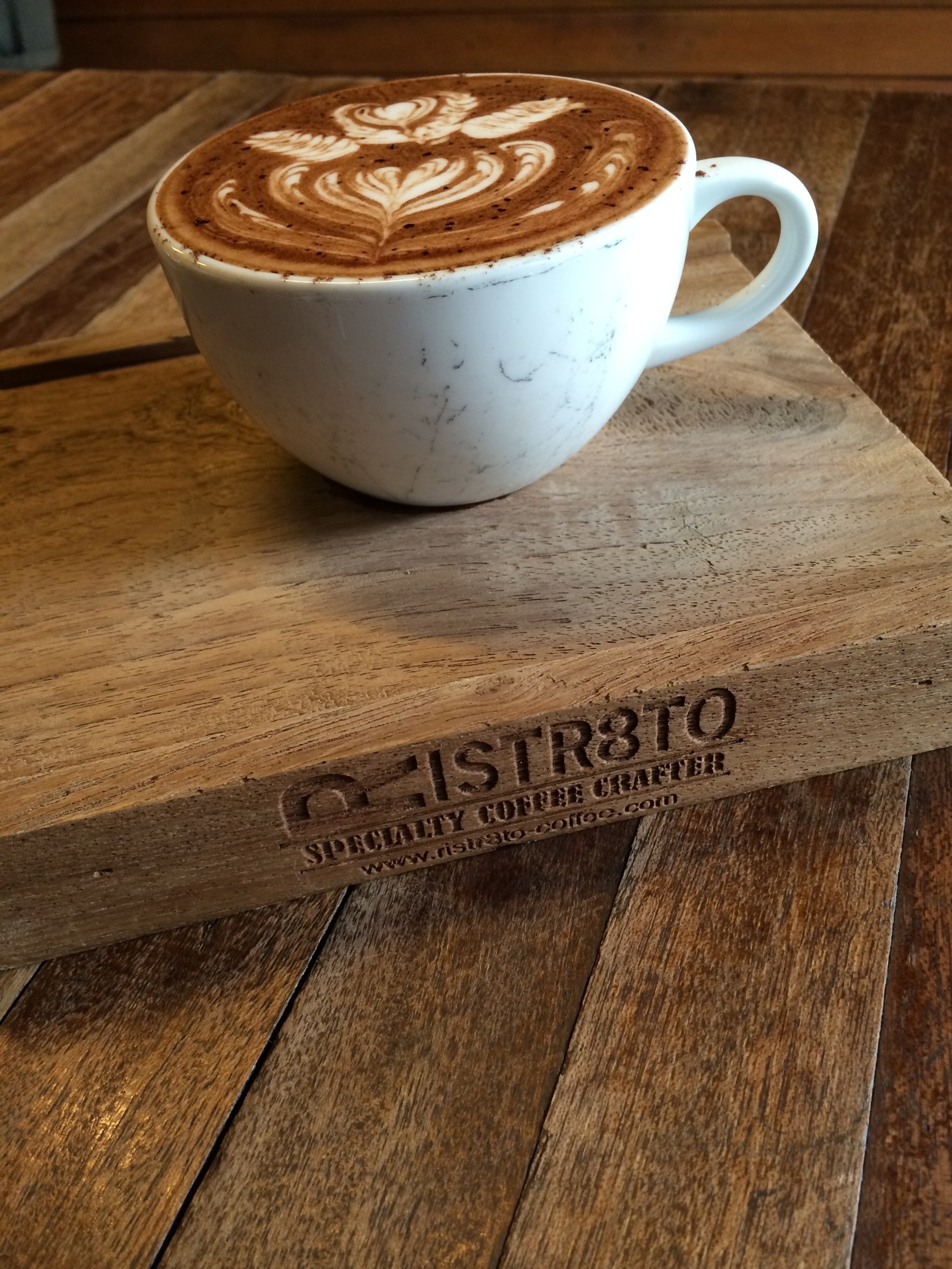 Ristr8to Coffee in Chiang Mai, Thailand not only tastes great, but looks great too! Their award winning latte art will make you want to snap a pic for sipping the delicious brew. Located in charming the Nimmanhemin neighborhood, there's plenty of things to see and do all around this cute little coffee shop. 