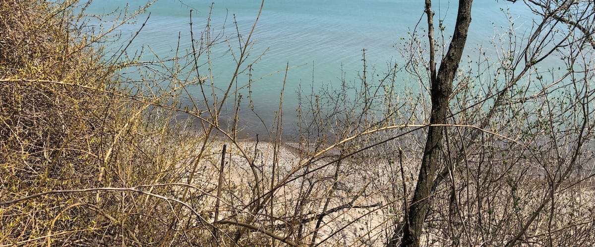 Nothin’ but blue skies! Serene and calm waters on Lake Michigan.
