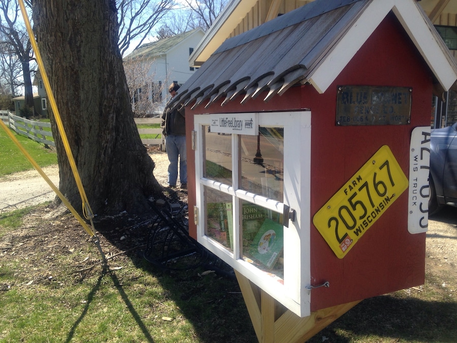 A free little library at the local farmers co-op. Come grab a book and get some yummy snacks