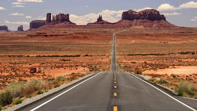 The view towards Monument Valley at the point where Forrest Gump ended his cross country journey in the movie. There is a small wooden sign marking the spot and a few parking spaces along this stretch of the highway as it is a popular place for stopping to take some pictures. #OnTheRoad