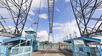 The coolest "bridge" I have ever "driven" across!  Drive aboard and take flight over the River Usk in this 110 year old engineering marvel.  Only six of these historic bridges remain in operation, and the Newport Bridge is the longest with a 196m span (645ft).

A modern highway bridge passes nearby, so these days the bridge operates as a novelty.  Show up on either side, and the operator will come pick you up!  You can also climb the steps and walk across the 54m