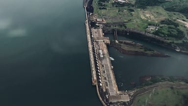 The Itaipu Dam is a hydroelectric dam on the Paraná River located on the border between Brazil and Paraguay. The construction of the dam was first contested by Argentina, but the negotiations and resolution of the dispute ended up setting the basis for Argentine–Brazilian integration later on. Wikipedia 