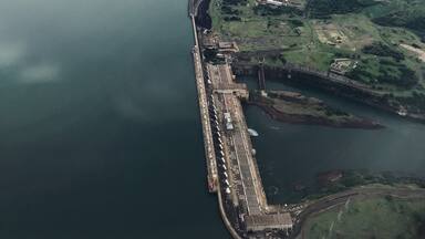 The Itaipu Dam is a hydroelectric dam on the Paraná River located on the border between Brazil and Paraguay. The construction of the dam was first contested by Argentina, but the negotiations and resolution of the dispute ended up setting the basis for Argentine–Brazilian integration later on. Wikipedia 