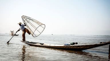 Fishing dance, that man is a Myanmar fisher, he living Inle, live by fishing.   #Blue