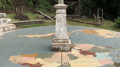 If you come here, you can take pictures straddle the equator.