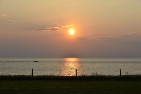 Lobster boat at sunset. 