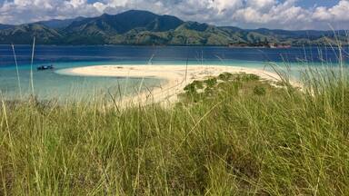 The green volcanic landscapes of the 17 islands national park, Riung, Indonesia. April is the best month to visit Indonesia, just at the end of the rainy season. #greeneverywhere #green #lifeatexpedia