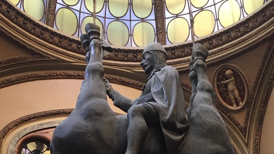 Unusual David Cerny sculpture inside the Lucerne shopping arcade. King Wenceslas astride an upside down horse.