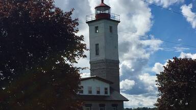Lighthouse located  where the Oswegatchie River and St Lawrence River connect. It is now a private residence. 
