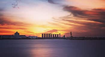 Out on the southern break wall over looking the sugar stacks as the sun sets.