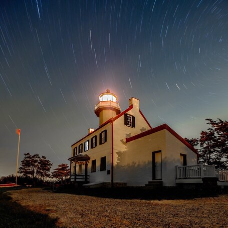 value: "This is a lighthouse on the Delaware bay perfect for Astrophotgraphy such as star trails and milkyway . Being it\342\200\231s on the coast of New Jersey although I have not shot at sunrise I\342\200\231m sure would be ideal. #bvsblue "
