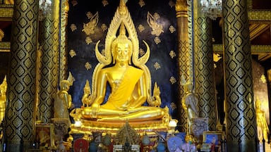 Beautiful The attitude of subduing Mara Buddha Image in Thailand . In Sukkhothai period  .The Lord has a wide elbow 5 1 5 creep natak inches (2.875 m) high seven cubit (3.5 meters) with cast polished bronze Buddha.