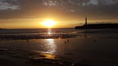 Sunset over Margate Harbour at low tide