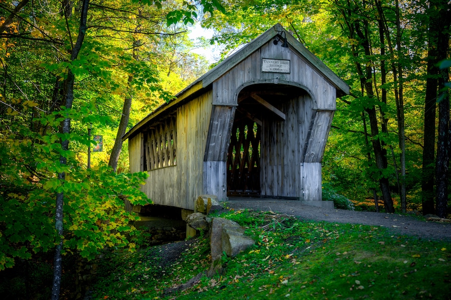 The Tannery Hill Covered Bridge spans the Gunstock Brook just north of the village proper in Gilford. The bridge was constructed by Tim Andrews and presented to the community of Gilford by the Gilford Rotary Club in 1995. It was built to link the town hall with the rest of the town center. It is named for the tannery that once stood in the area.
#LocalSecrets #MyBackyard #Trovember