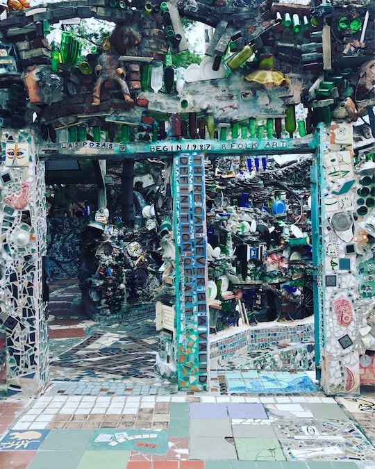 Entrance to Philadelphia Magic Gardens featuring intricate mosaic art and vibrant colors.