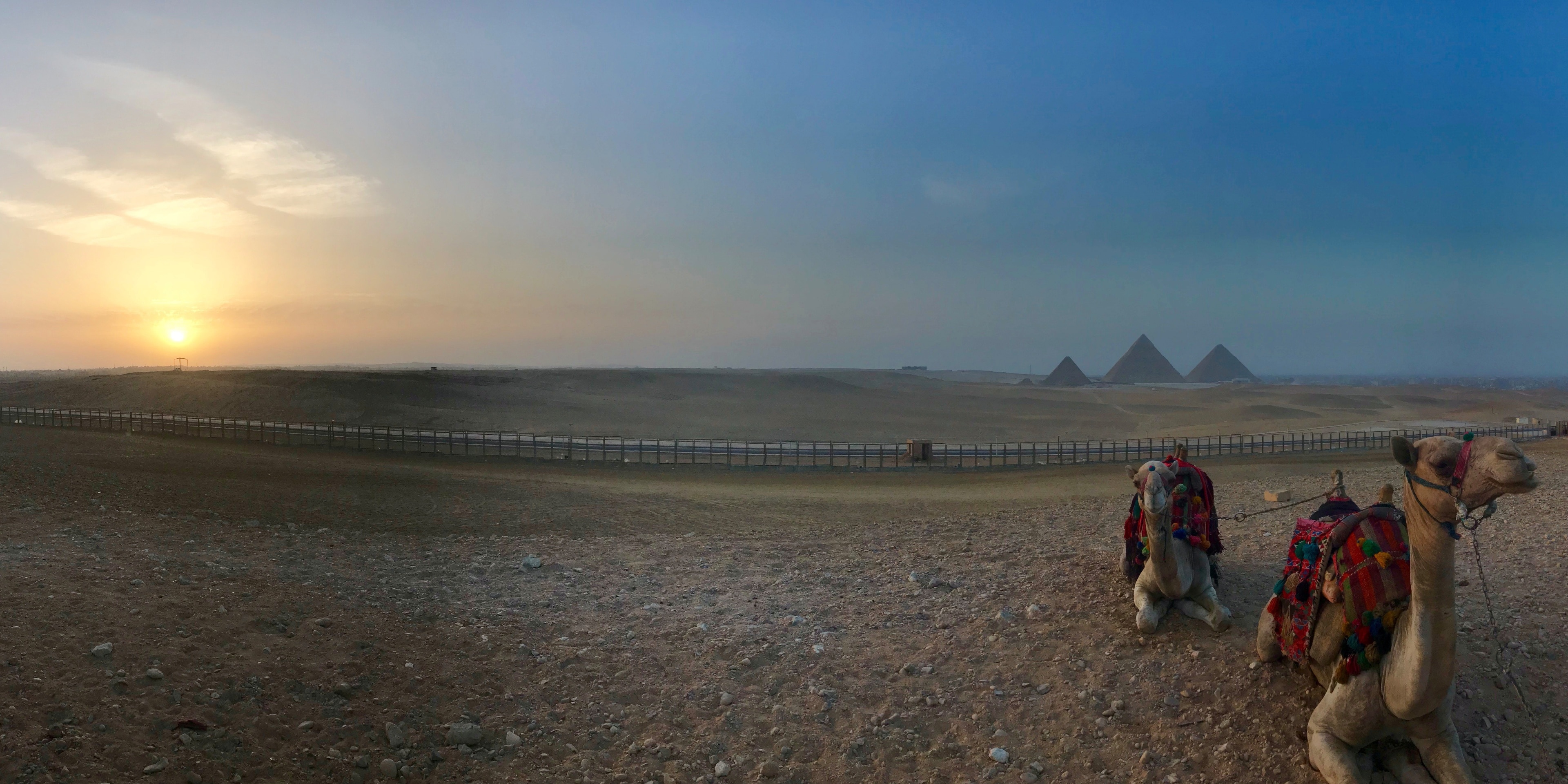 Panoramic view of sun setting on Pyramids of Giza #adventure