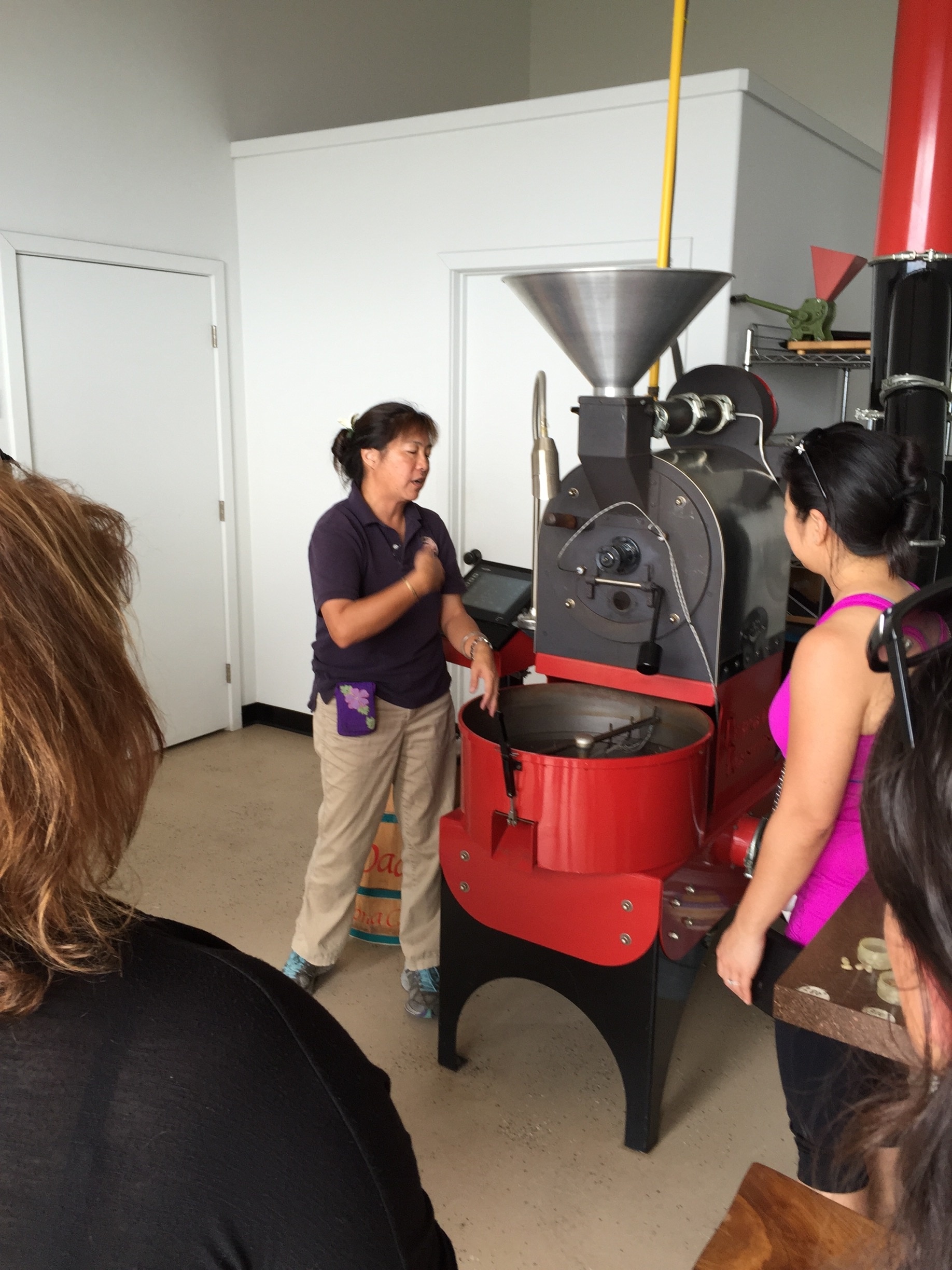 Learning how the roast is perfected with Hula Daddy owner. 