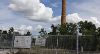 A single smokestack is all that remains of the former Jeep plant in Toledo, OH. 

The Parkway Annex was opened in 1904 as a bicycle factory. Its use as an automobile assembly plant dates from 1910, when it was purchased by Willys-Overland. The plant began producing the Jeep in the 1940s and was renamed the Toledo Assembly Plant when Chrysler purchased American Motors