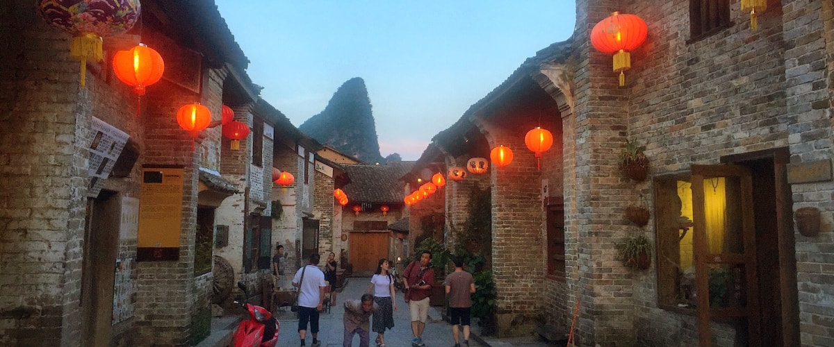 After sunset, red lanterns illuminate this little Chinese village. Huangyao 黄姚 in Guangxi, China.