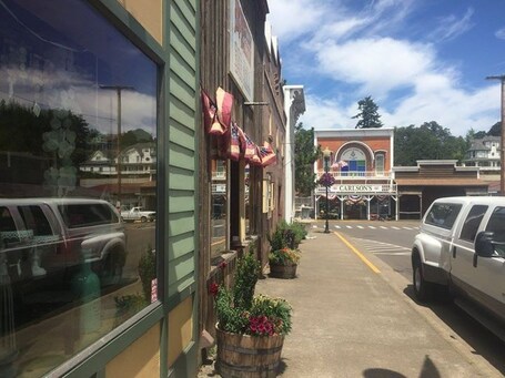 value: "Brownsville, Oregon is home to several filming spots from Stand By Me! This is Main Street, where you see Gordie at the very beginning of the movie. Definitely worth the stop off I-5 just north of Eugene!"
