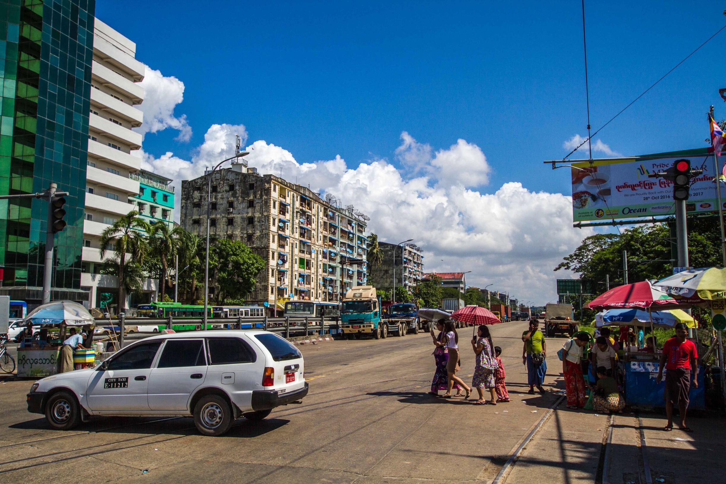 The streets of Yangon, particularly near Botataung Pagoda, show a fascinating collision of local traditions, colonial history and modern advancement