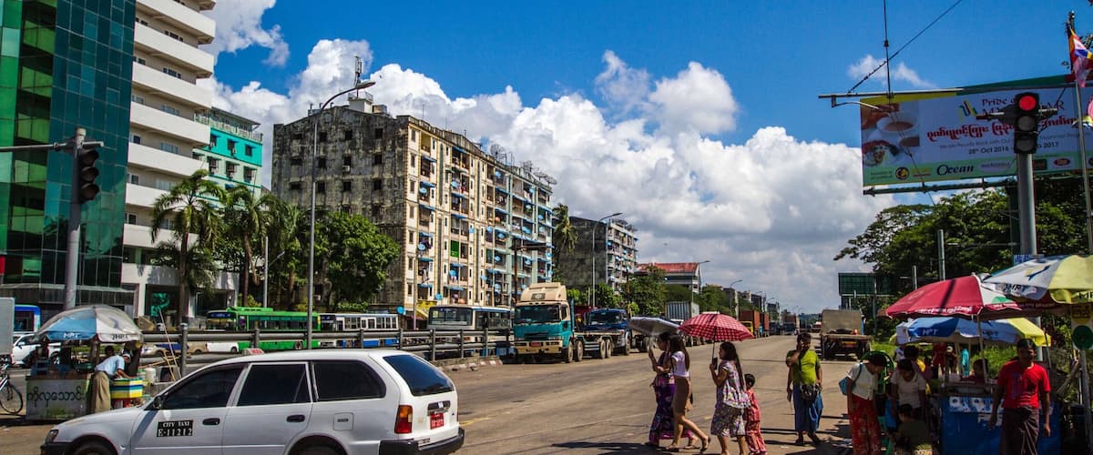 The streets of Yangon, particularly near Botataung Pagoda, show a fascinating collision of local traditions, colonial history and modern advancement