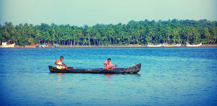 This place in north Kerala is very beautiful and calm. House boats are available in the Periyar river. Two fisherman singing and boating waved to me. Click !!