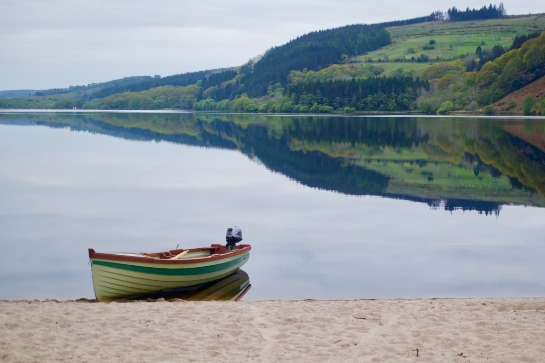 Serene views of Loch Dan as the sun sets over the Wicklow mountains. Just south of Dublin, it's the perfect retreat for a peaceful weekend with only the sound of the sheep on the hills #LifeAtExpedia #Ireland 